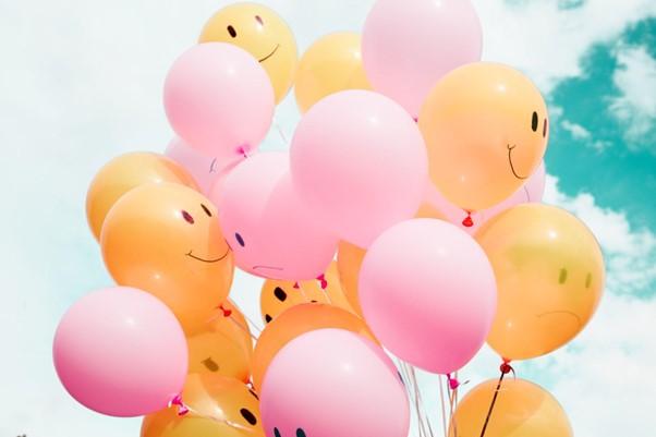 Balloons with smiley faces on